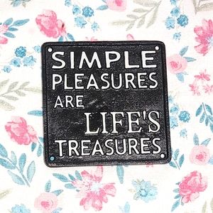 Simple pleasures cast iron sign